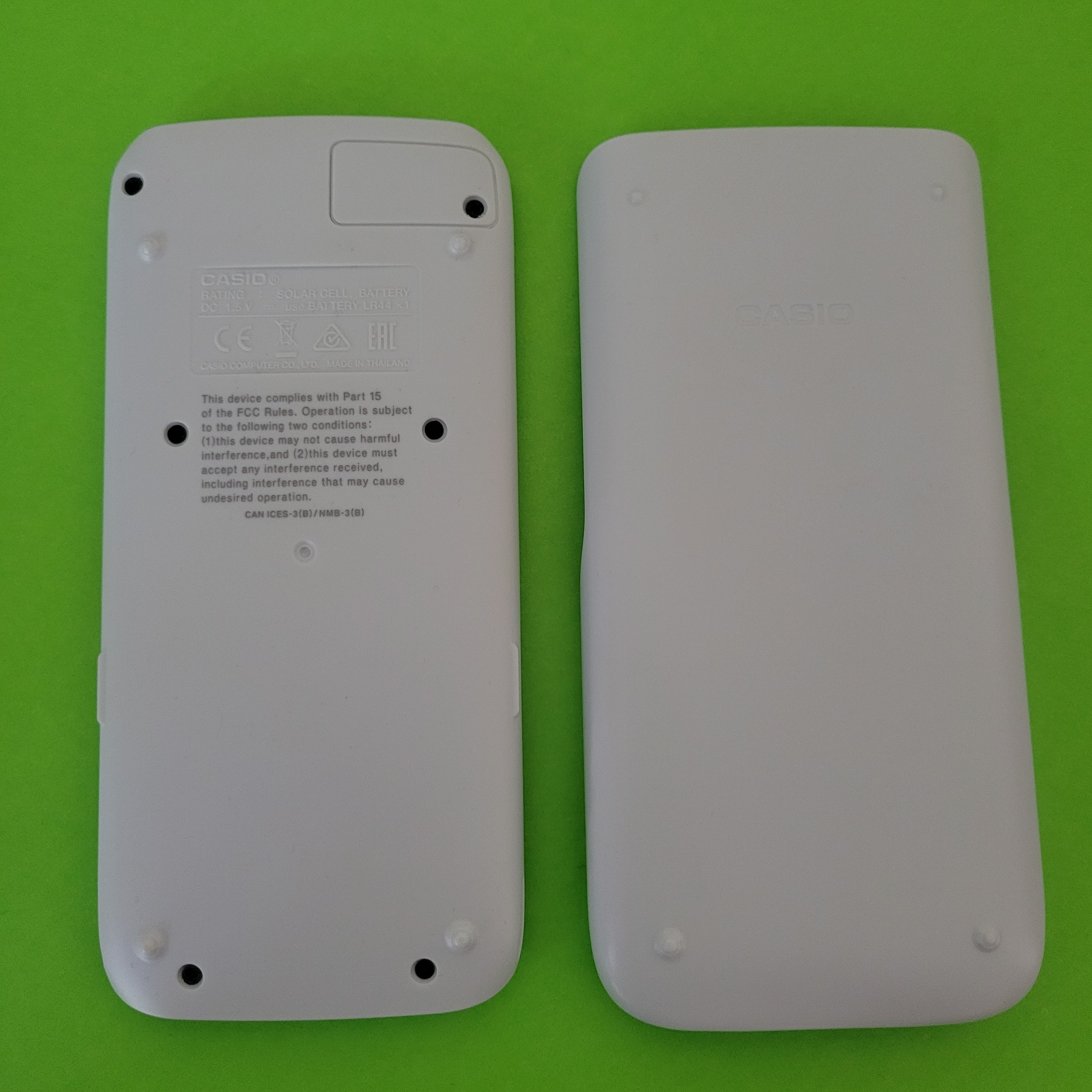 An image of the back and case of a Casio fx-991EX Classwiz scientific/engineering calculator